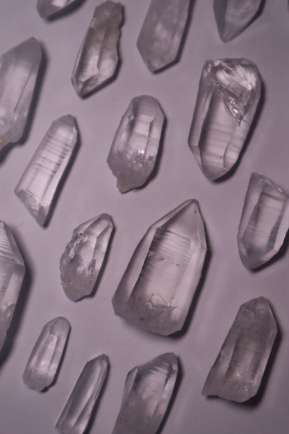 clear lemurian quartz crystal seed raw point