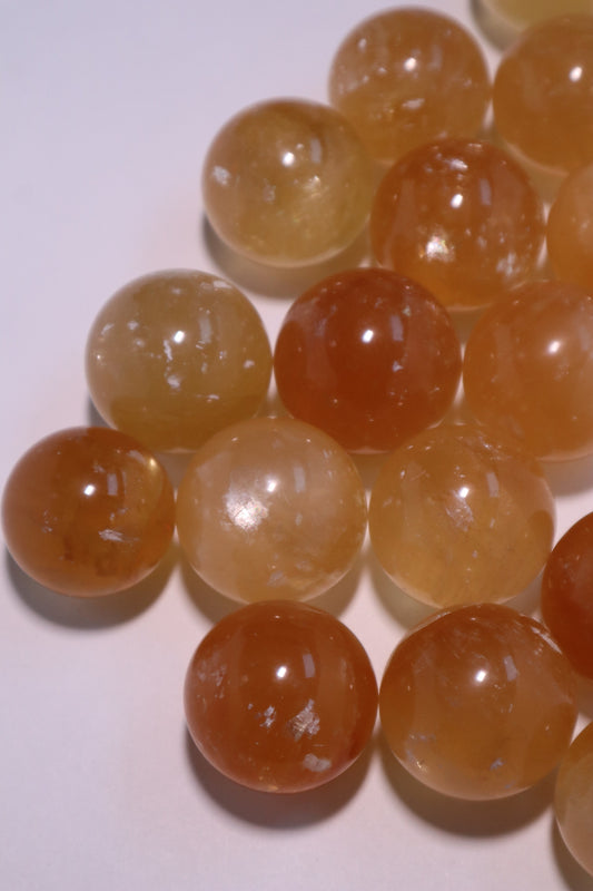 honey calcite crystal sphere