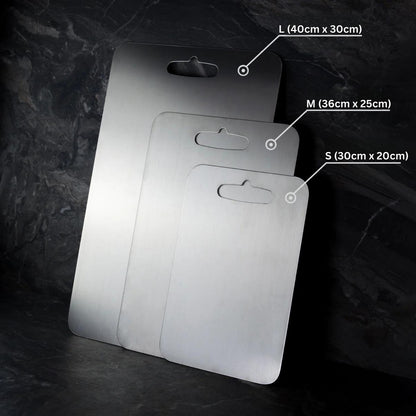 Knightsax Privateer 
®
 three silver titanium cutting boards in sizes S, M, and L with hanging holes.